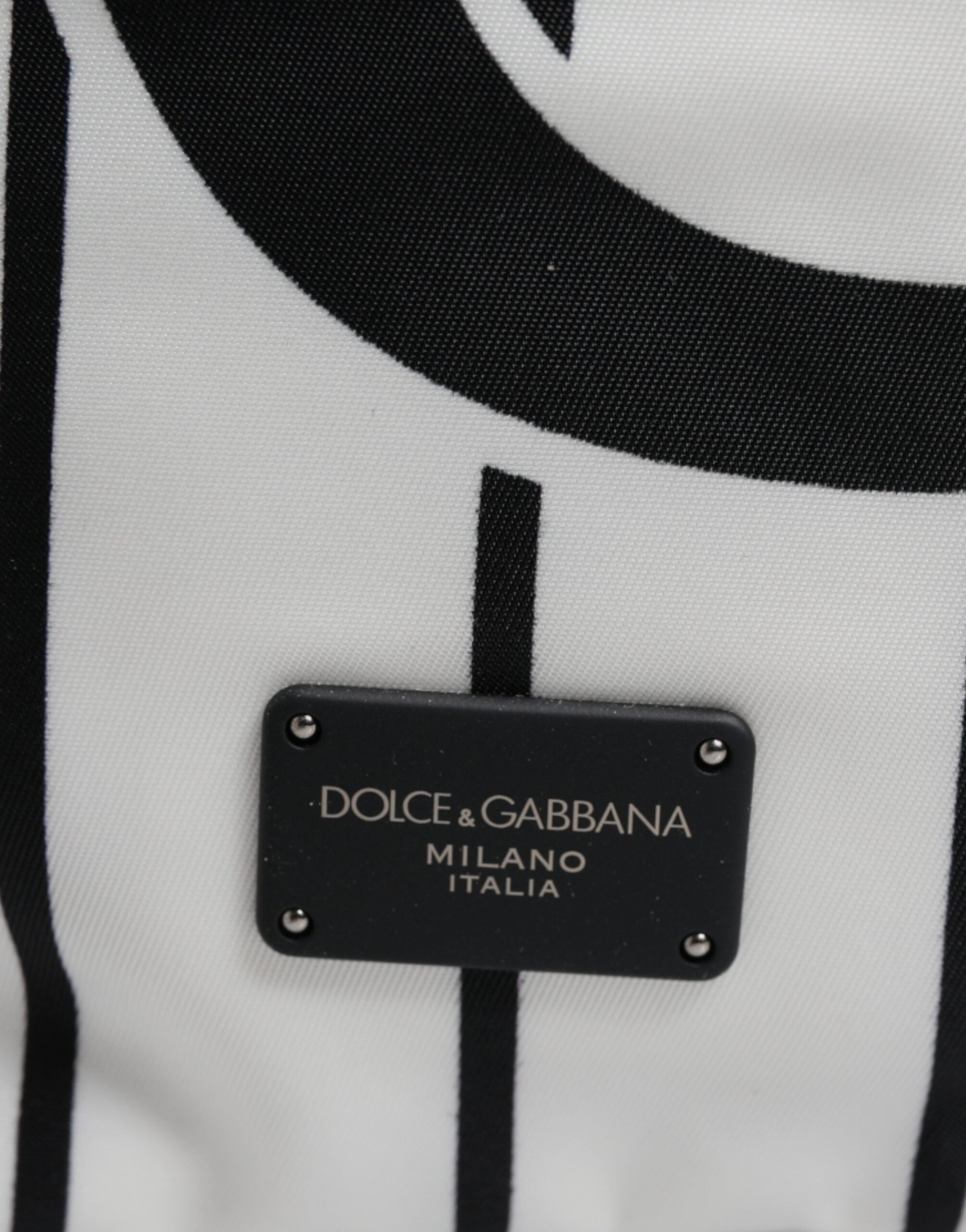 Sac à dos pour homme Dolce & Gabbana Vulcano Royal King en noir et blanc avec motif imprimé, style élégant et moderne.