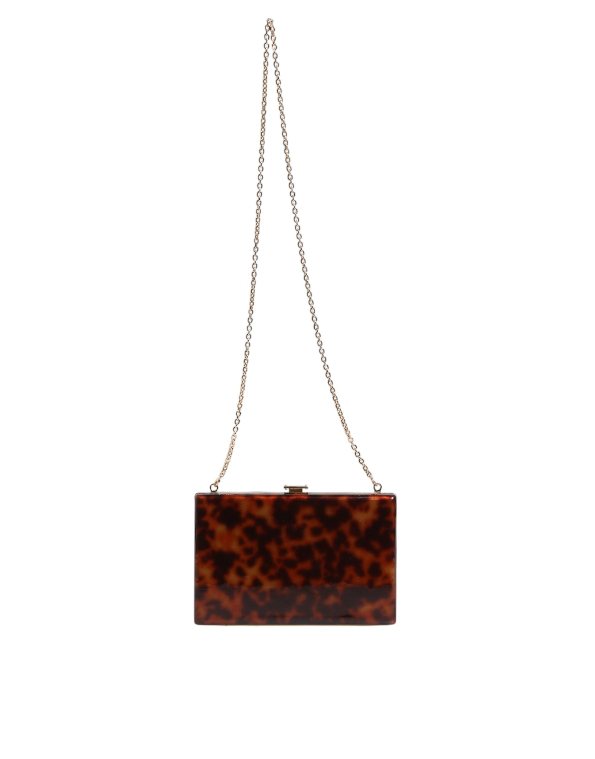 Sac clutch en cuir marron Dolce & Gabbana, sac à main de soirée avec bandoulière, finition élégante et détails sophistiqués.