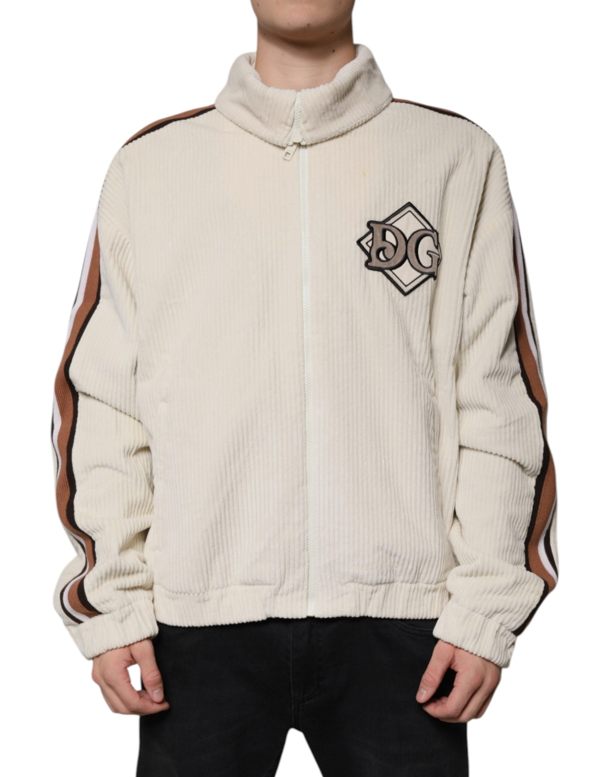 Veste en velours côtelé beige Dolce & Gabbana avec logo appliqué, fermeture éclair complète, style décontracté et élégant.