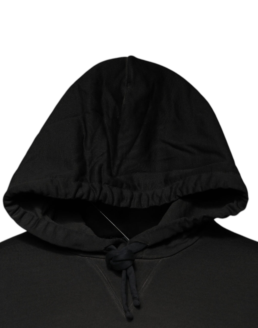 Sweat à capuche noir en coton Dolce & Gabbana avec logo DG Shield, porté, vue de face.
