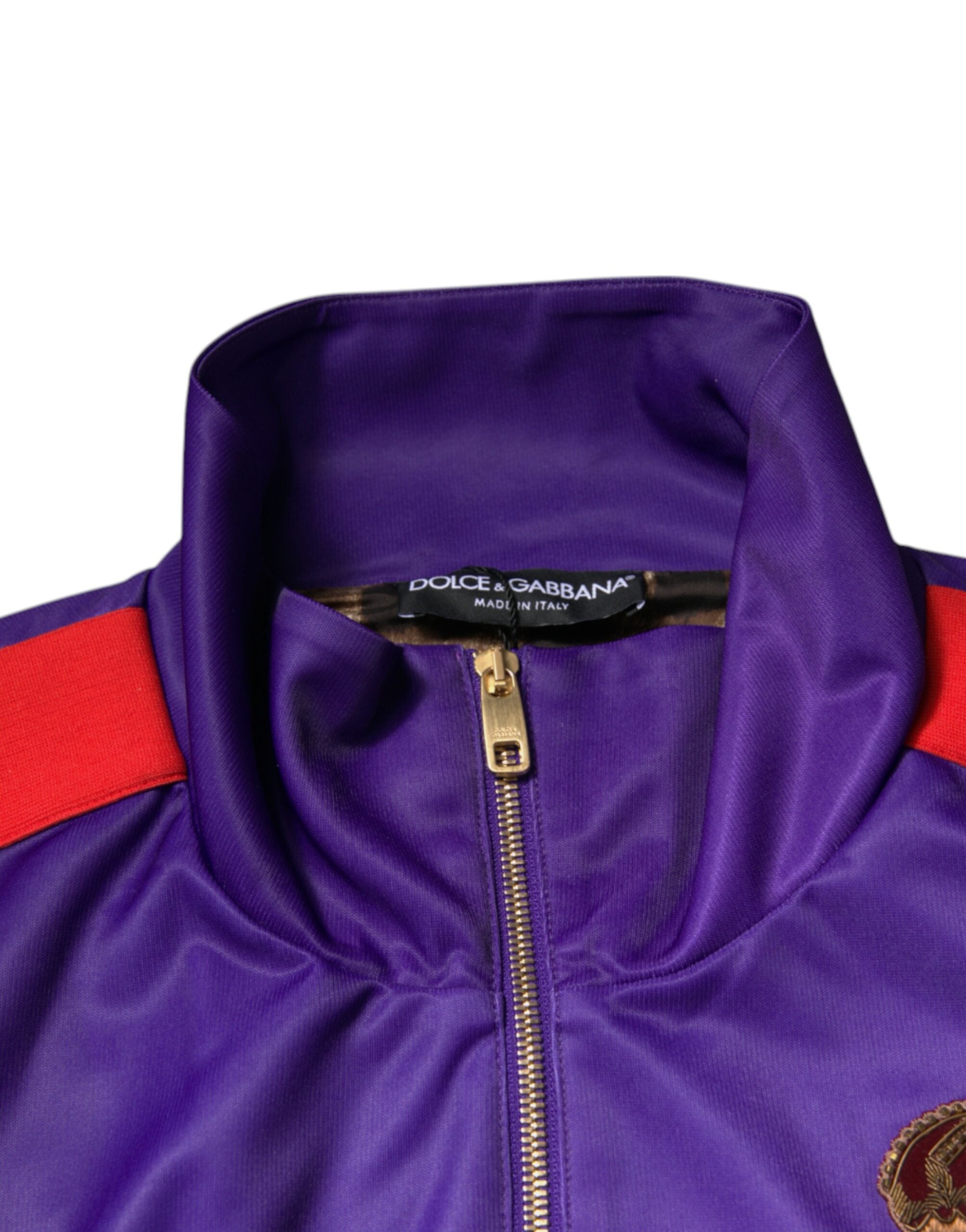 Pull bomber Dolce & Gabbana violet année du cochon à zip complet avec motif de cochon, design coloré et tendance.