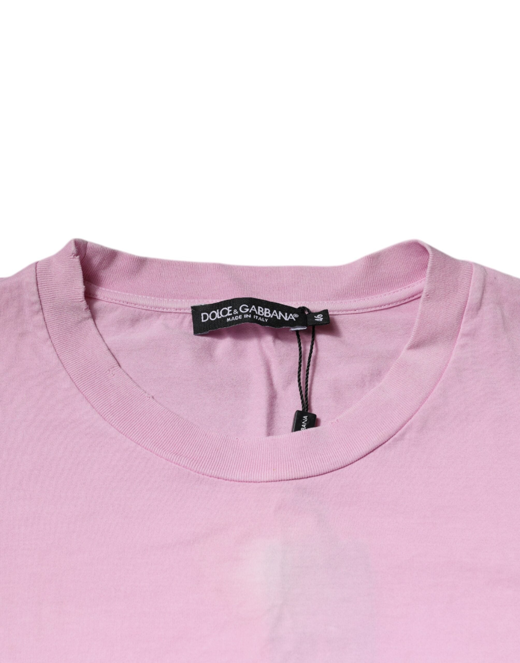 T-shirt en coton rose avec logo imprimé de Dolce & Gabbana, col rond, design moderne et élégant.