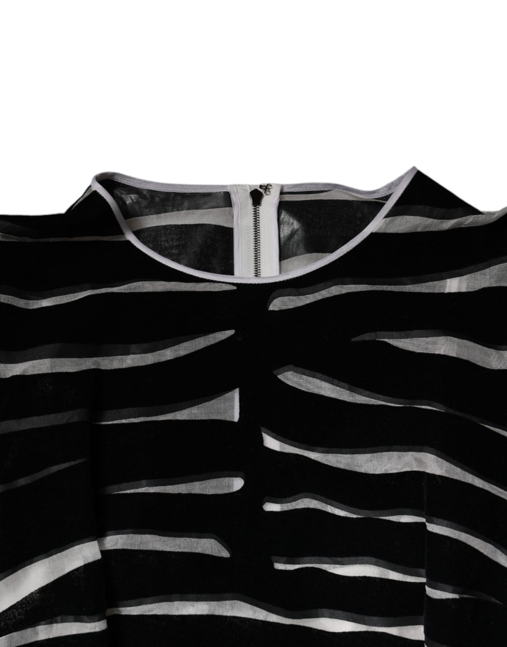 Robe courte Dolce & Gabbana à motif zèbre noir et blanc, coupe cintrée et style trapèze, pour une allure élégante.