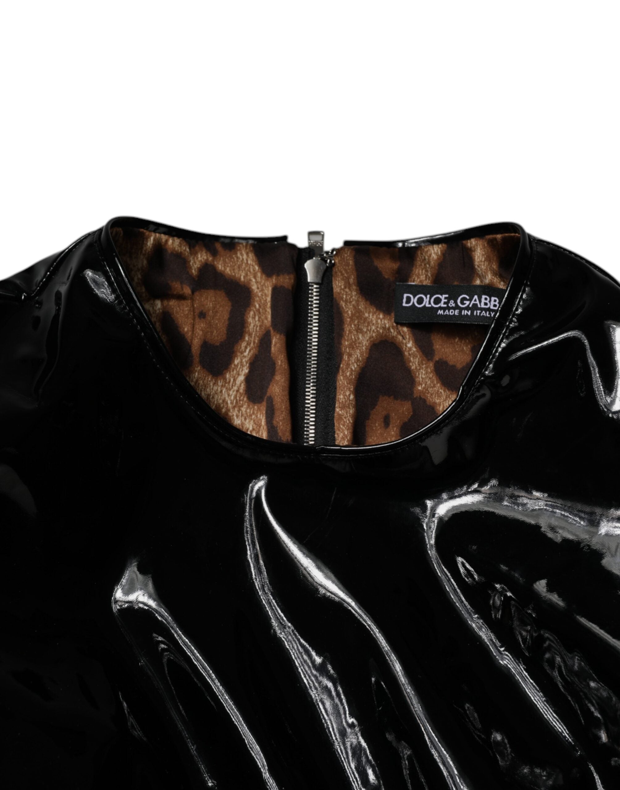 Robe courte en cuir verni noir avec manches bouffantes Dolce & Gabbana, style élégant et sophistiqué.