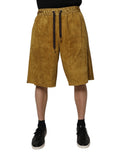 Shorts homme en daim de mouton brun Dolce & Gabbana, bermuda élégants avec détails sophistiqués.