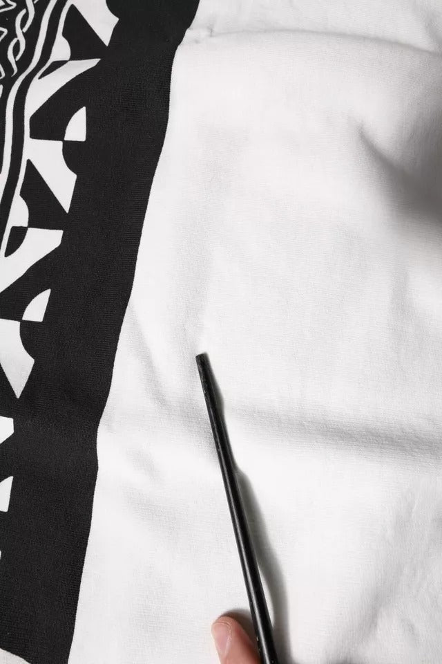 Sweatshirt en coton blanc et noir imprimé de Dolce & Gabbana, pull décontracté avec motif tendance et logo de la marque.