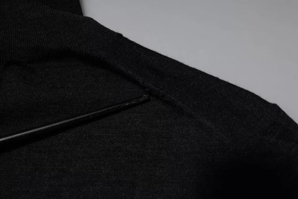 Pull en laine noir Dolce & Gabbana avec col roulé, vue de face, détail du tissu et du style élégant et classique.
