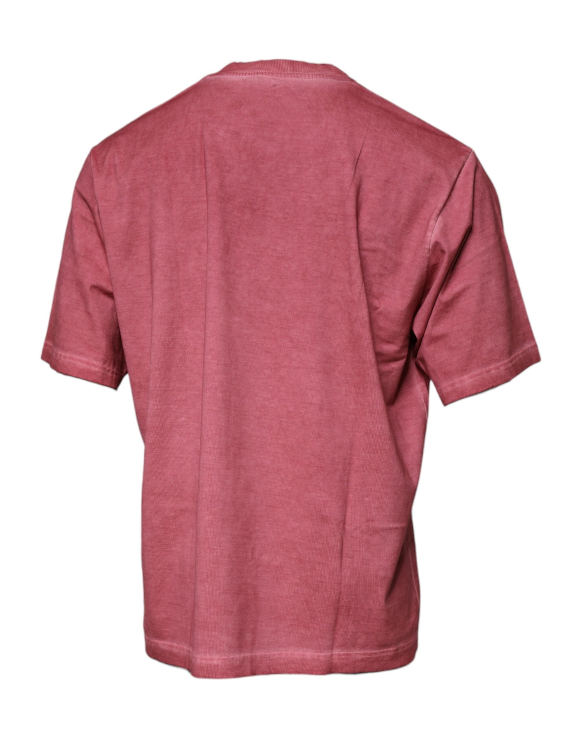 T-shirt en coton rose Dolce & Gabbana avec logo imprimé, col rond, style décontracté, visible sur l'image.