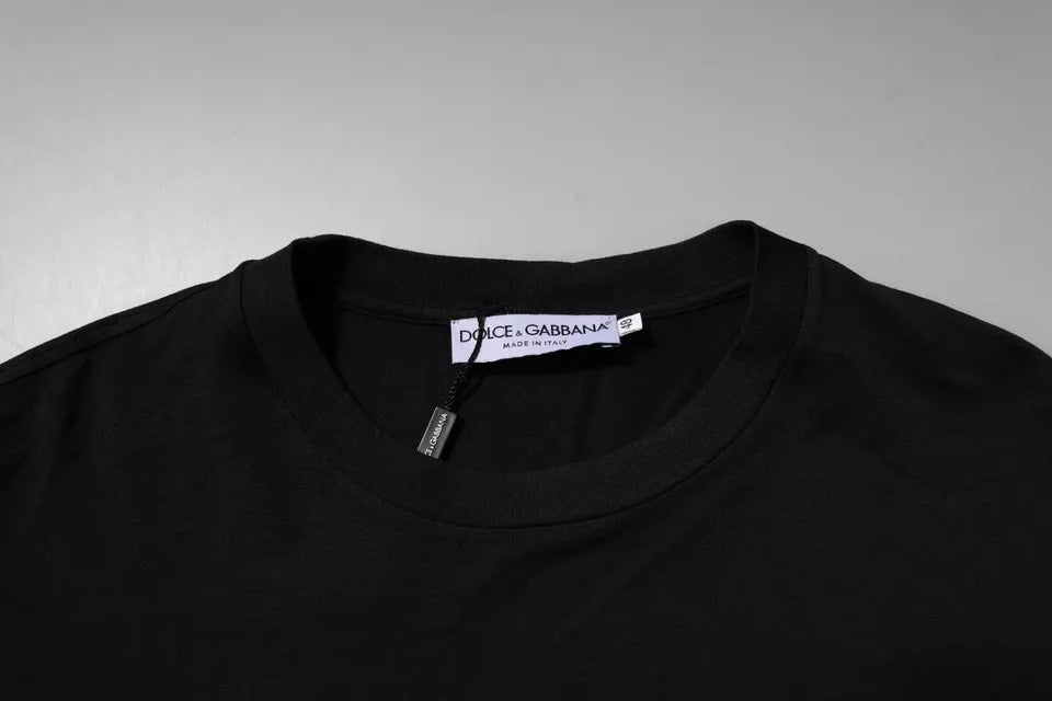 T-shirt à col rond en coton noir Dolce & Gabbana avec logo DG, visible sur l'image.