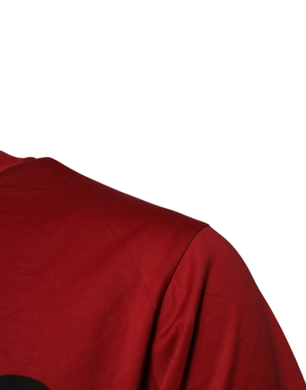T-shirt en coton rouge Dolce & Gabbana avec logo DG, col rond, design élégant et casual.