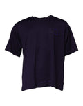 T-shirt en coton bleu marine Dolce & Gabbana avec logo DG, col rond, style décontracté, visible sur un mannequin.