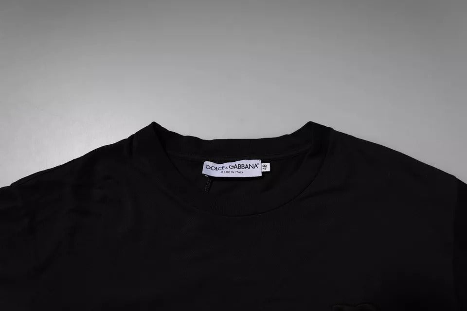 T-shirt à col rond en coton noir Dolce & Gabbana avec logo DG visible sur la poitrine.