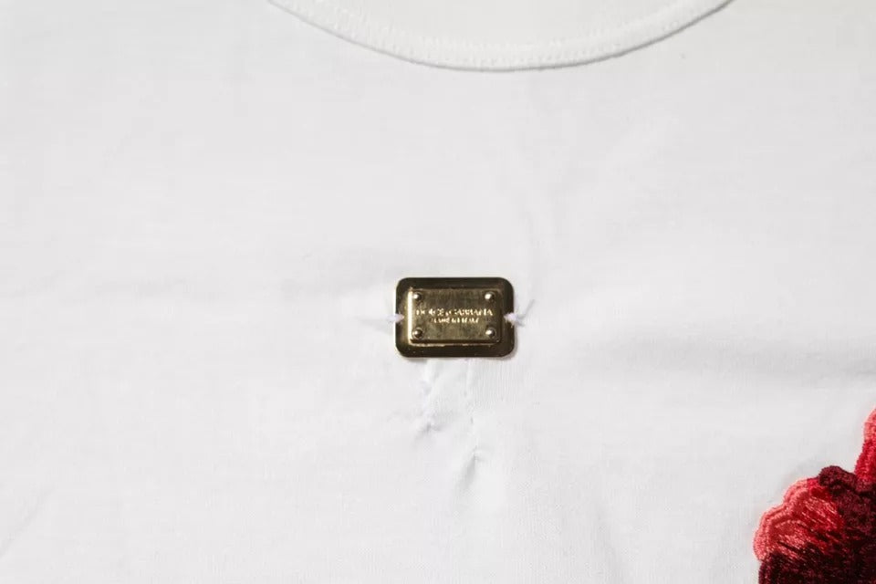 T-shirt blanc en coton Dolce & Gabbana avec logo floral, col rond, visible sur l'image.