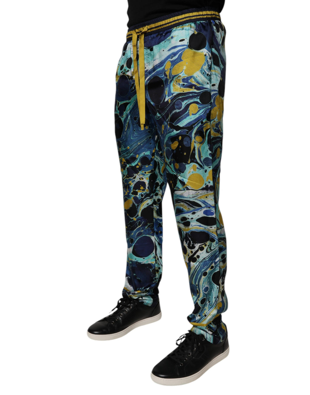 Pantalons de jogging Dolce & Gabbana à imprimé marbre multicolore, style décontracté et élégant pour homme.