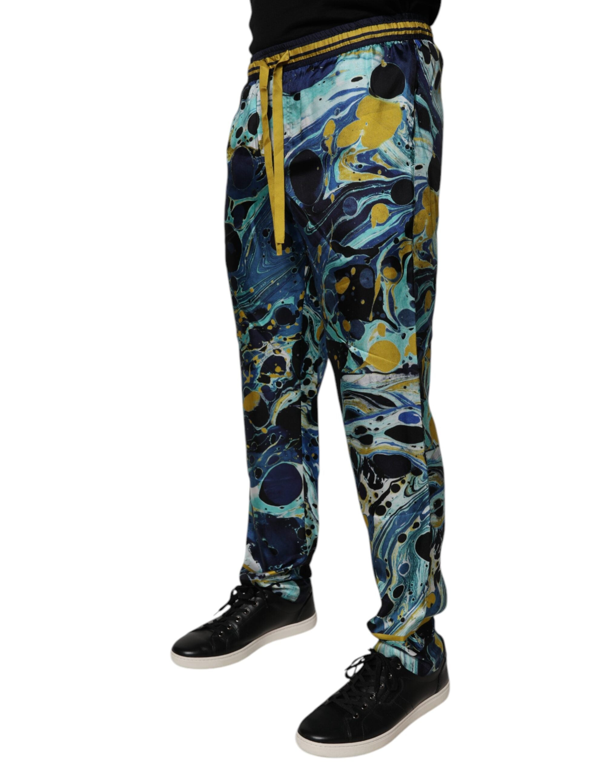 Pantalons de jogging Dolce & Gabbana à imprimé marbre multicolore, style décontracté et élégant pour homme.