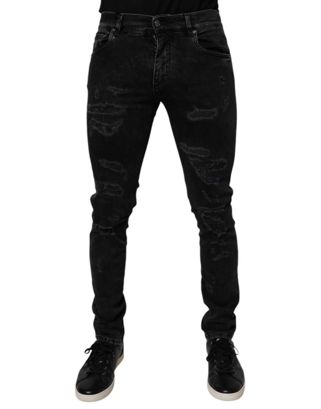 Jean skinny en denim noir pour homme de Dolce & Gabbana, avec déchirures et détails en coton.