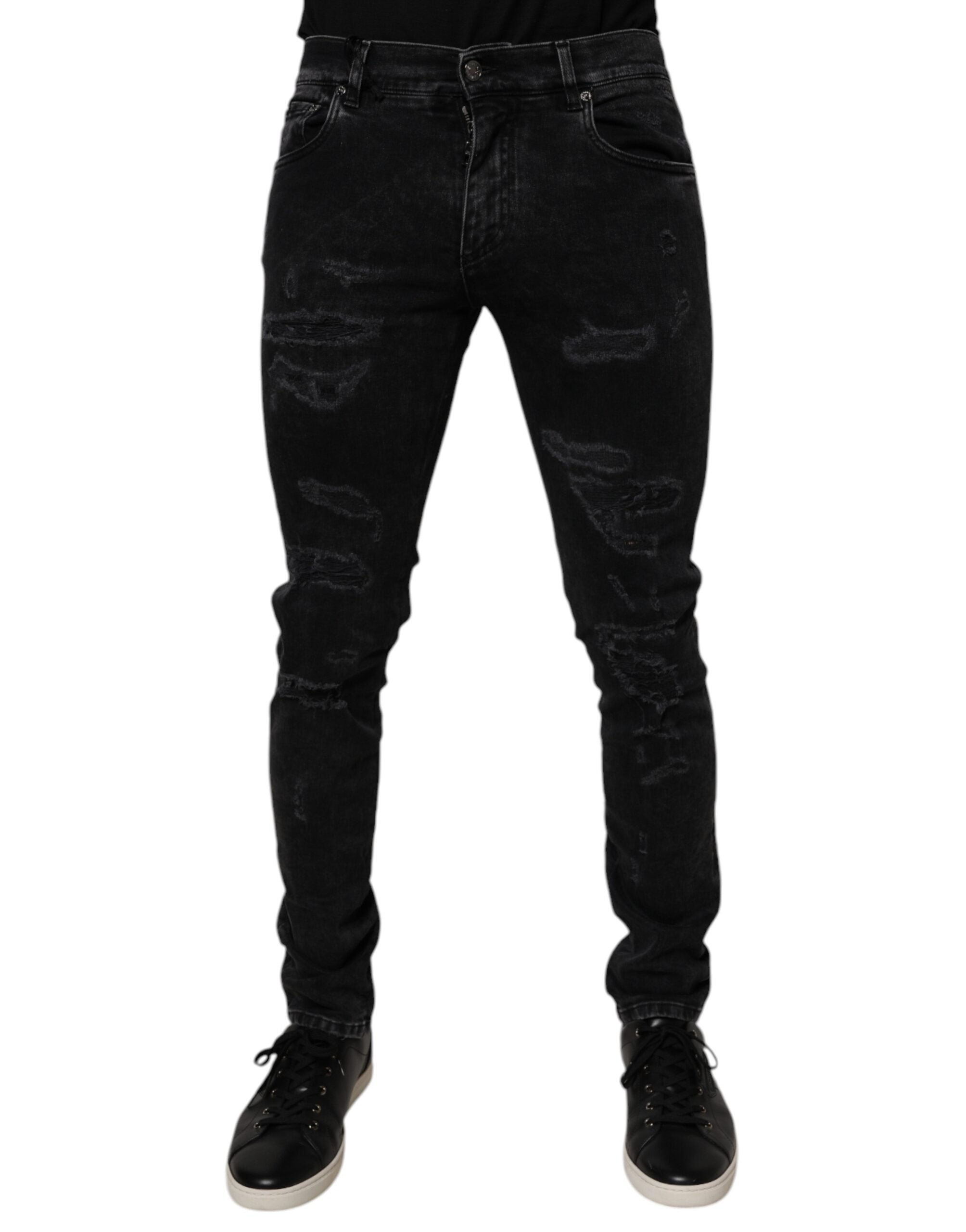 Jean skinny en denim noir pour homme de Dolce & Gabbana, avec déchirures et détails en coton.