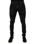 Jeans homme skinny en coton noir déchiré de Dolce & Gabbana, style décontracté avec détails usés.