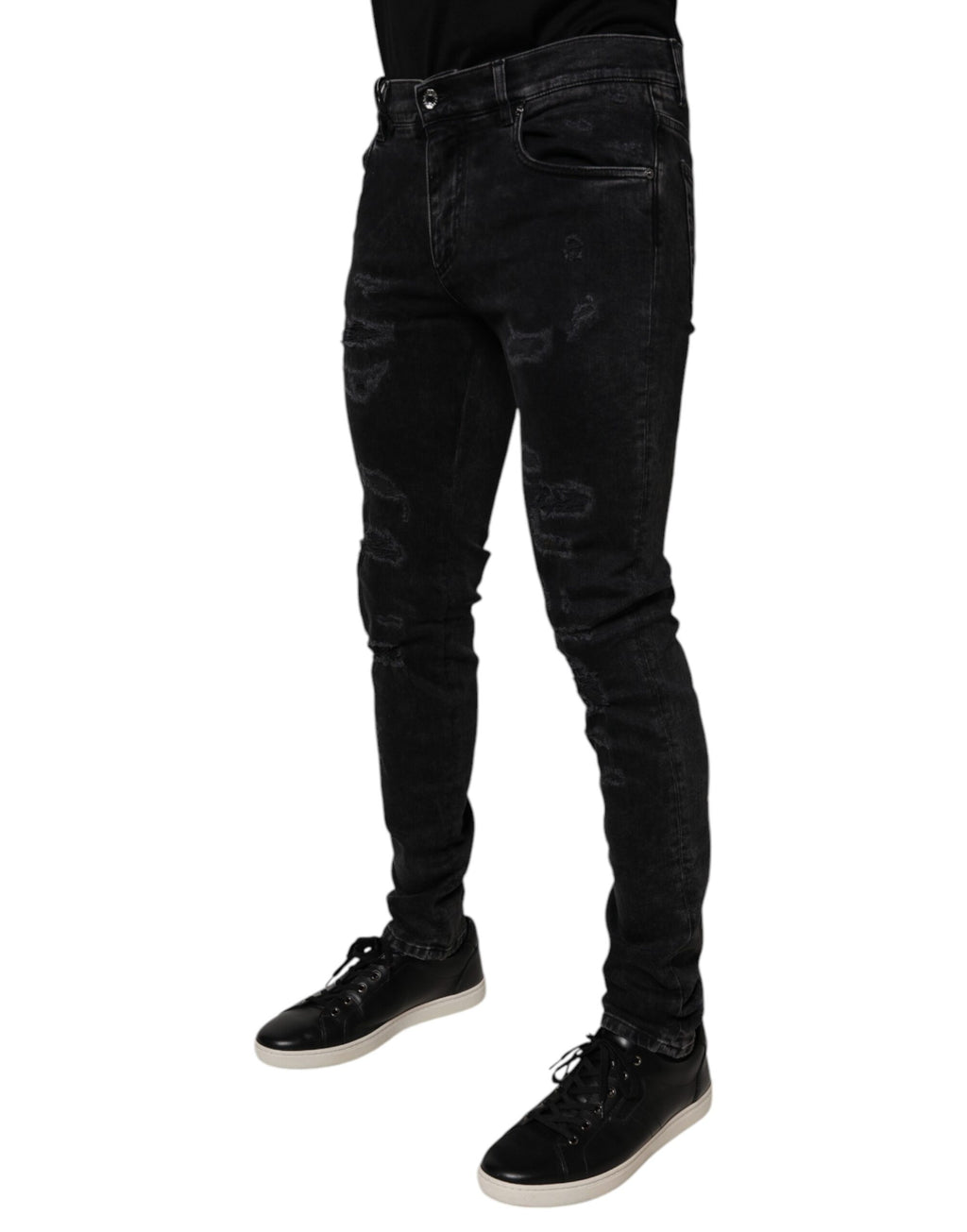 Jean skinny homme Dolce & Gabbana en coton noir déchiré avec un style usé, ajusté et tendance.