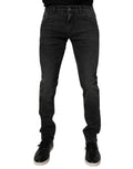 Jeans homme Dolce & Gabbana en coton stretch noir, coupe skinny et ajustée, denim élégant avec détails modernes.