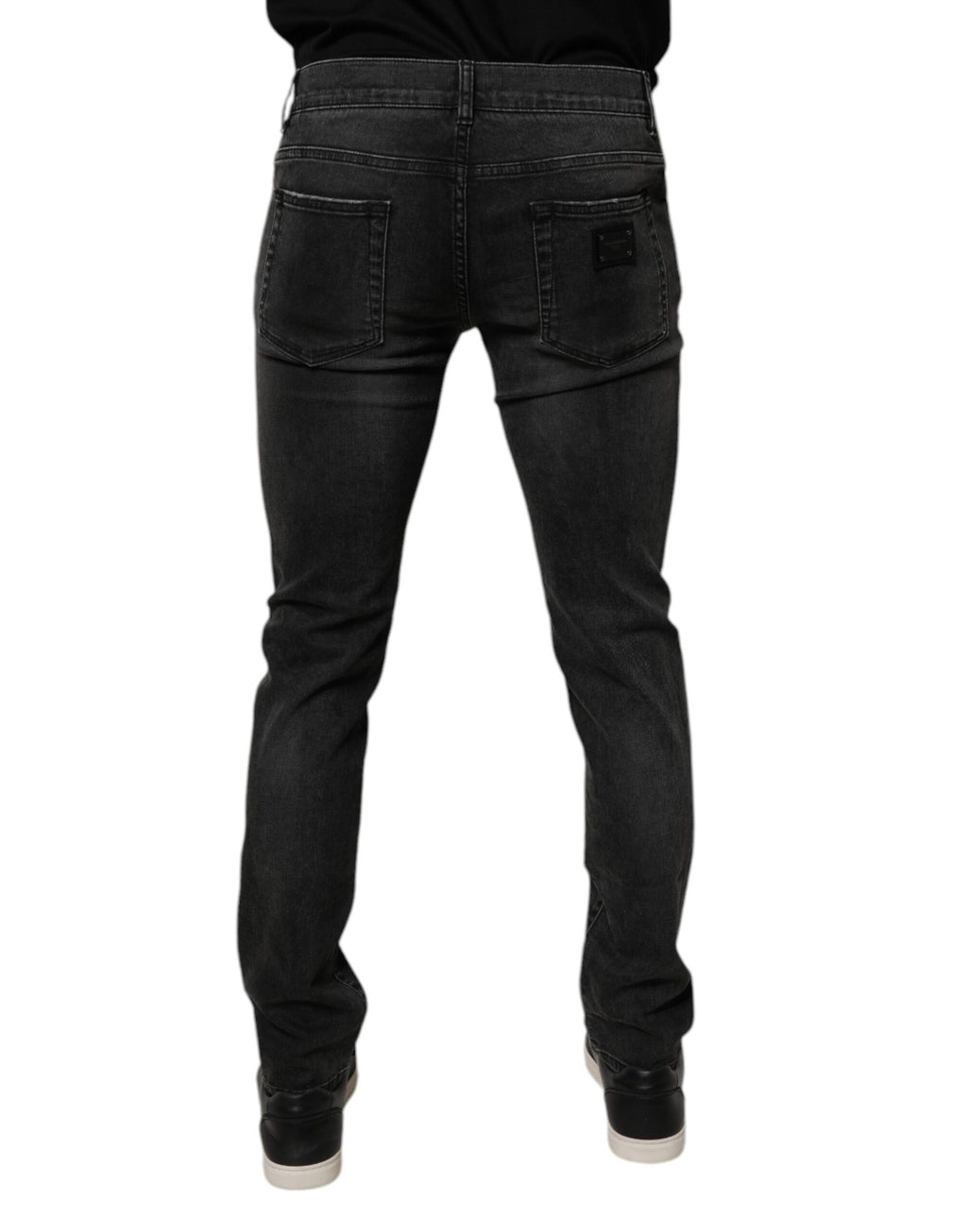 Jeans homme Dolce & Gabbana en coton noir extensible, coupe skinny, style denim, visible à l'image.