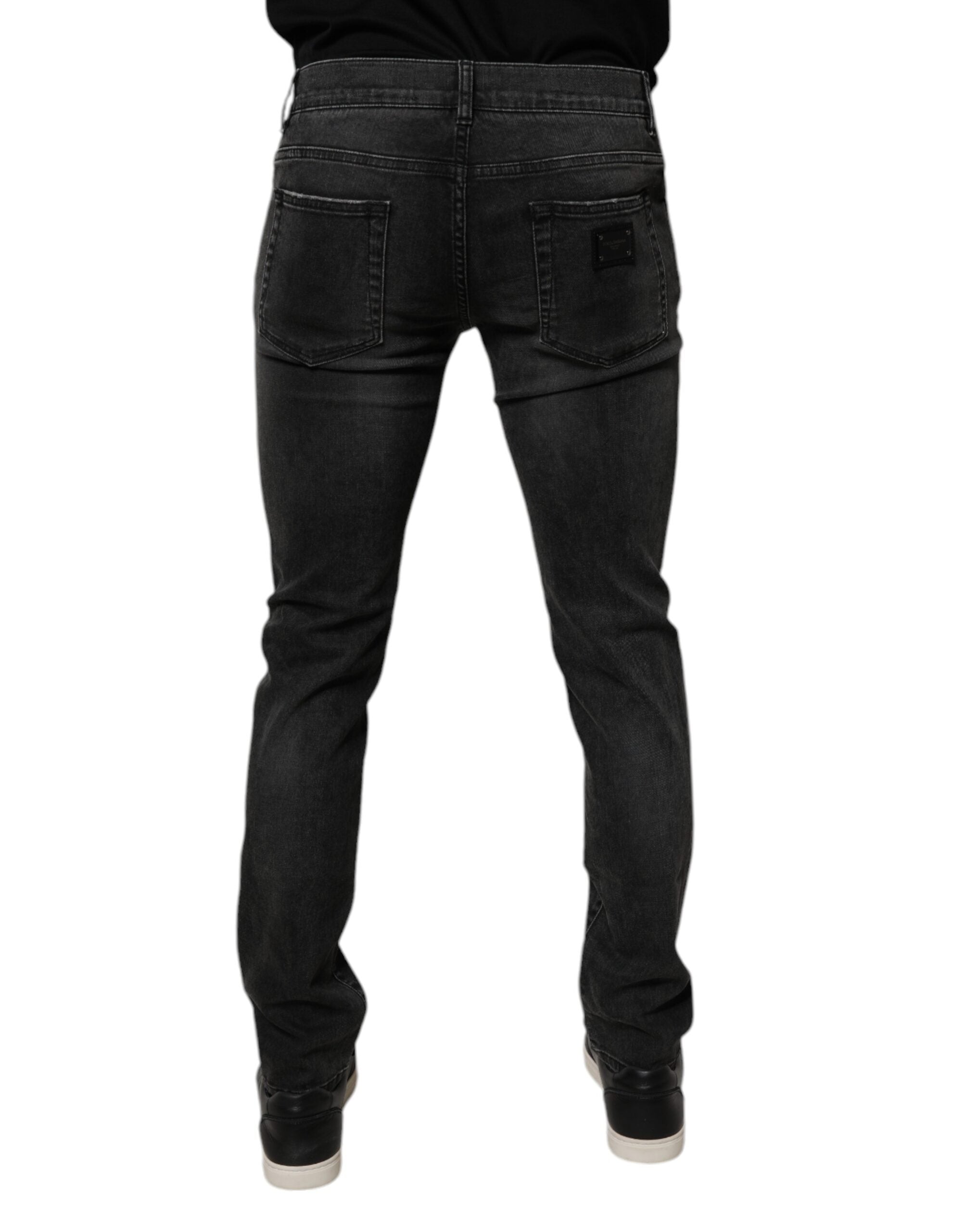 Jeans homme Dolce & Gabbana en coton noir extensible, coupe skinny, style denim, visible à l'image.