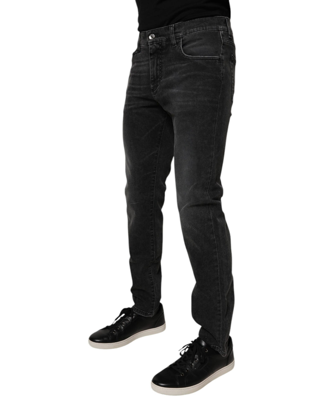Jeans homme Dolce & Gabbana en coton stretch noir, coupe skinny, style denim avec détails modernes.