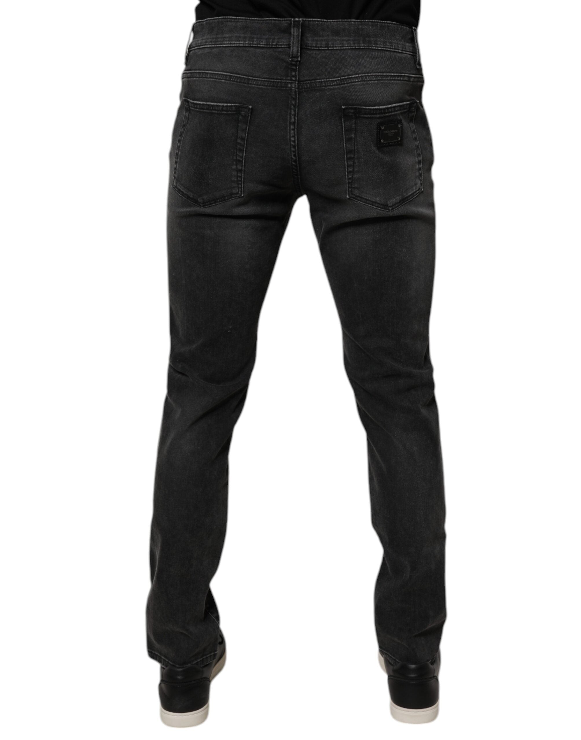 Jeans homme Dolce & Gabbana en coton noir, coupe skinny stretch avec délavé denim, style moderne et ajusté.