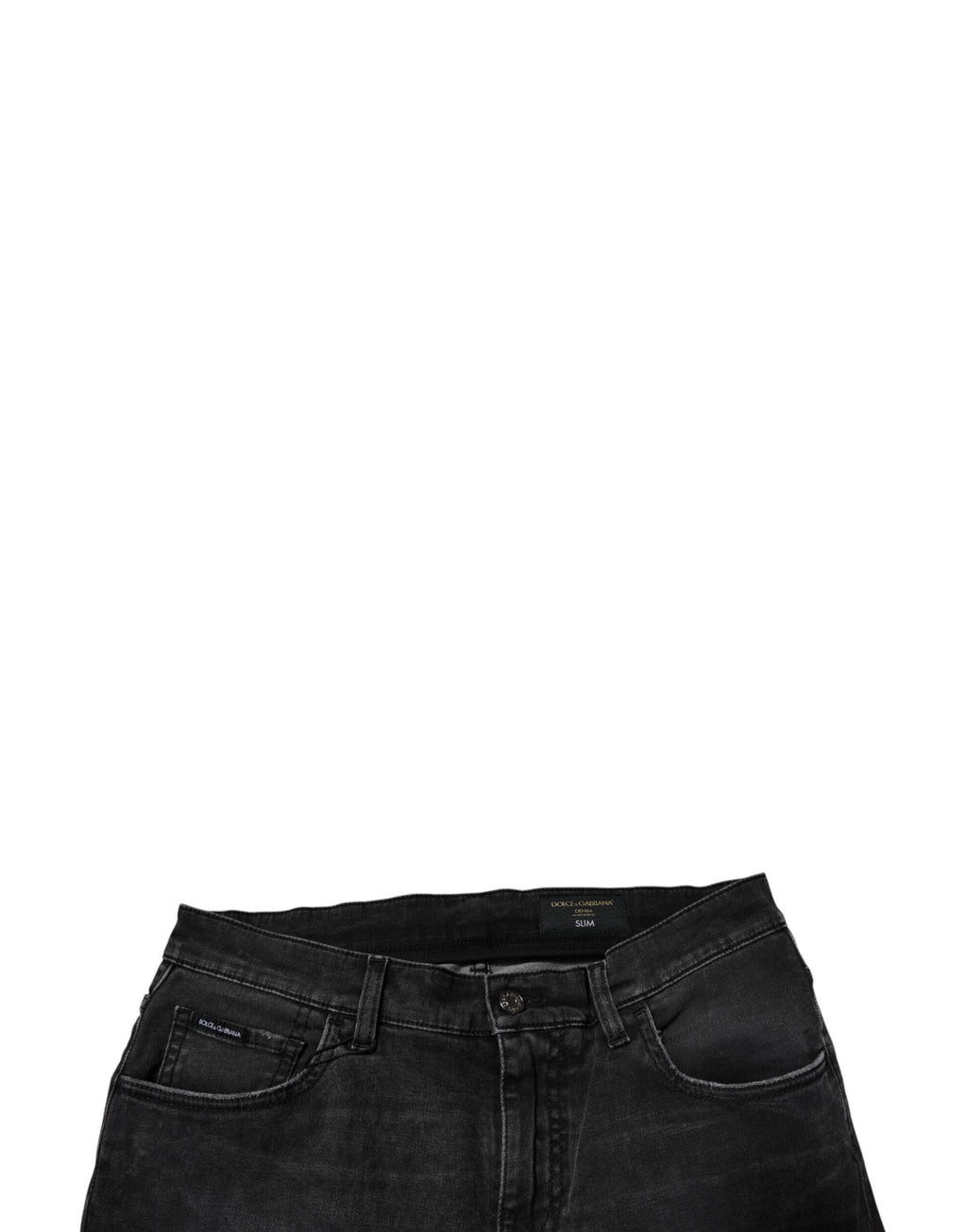 Jeans homme Dolce & Gabbana en coton noir, coupe skinny, denim stretch, visible détails de la texture et de la couture.