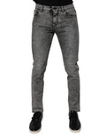 Jeans slim en denim gris foncé en coton délavé de Dolce & Gabbana, visible avec poches et fermeture éclair.