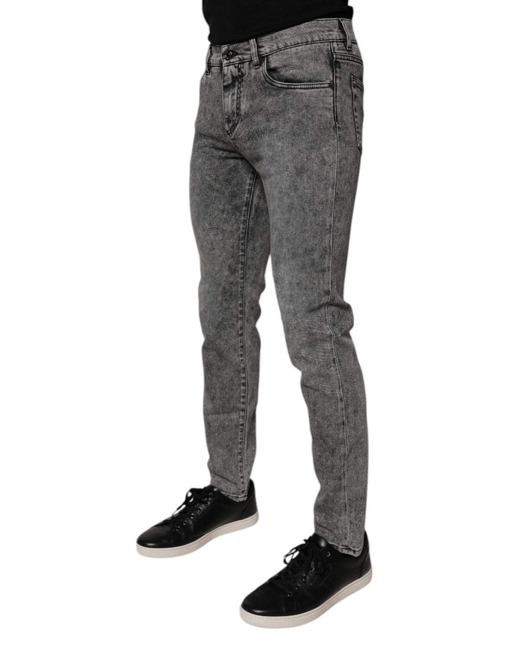 Jean slim en denim gris foncé en coton délavé de Dolce & Gabbana, visible avec coutures et fermeture éclair.