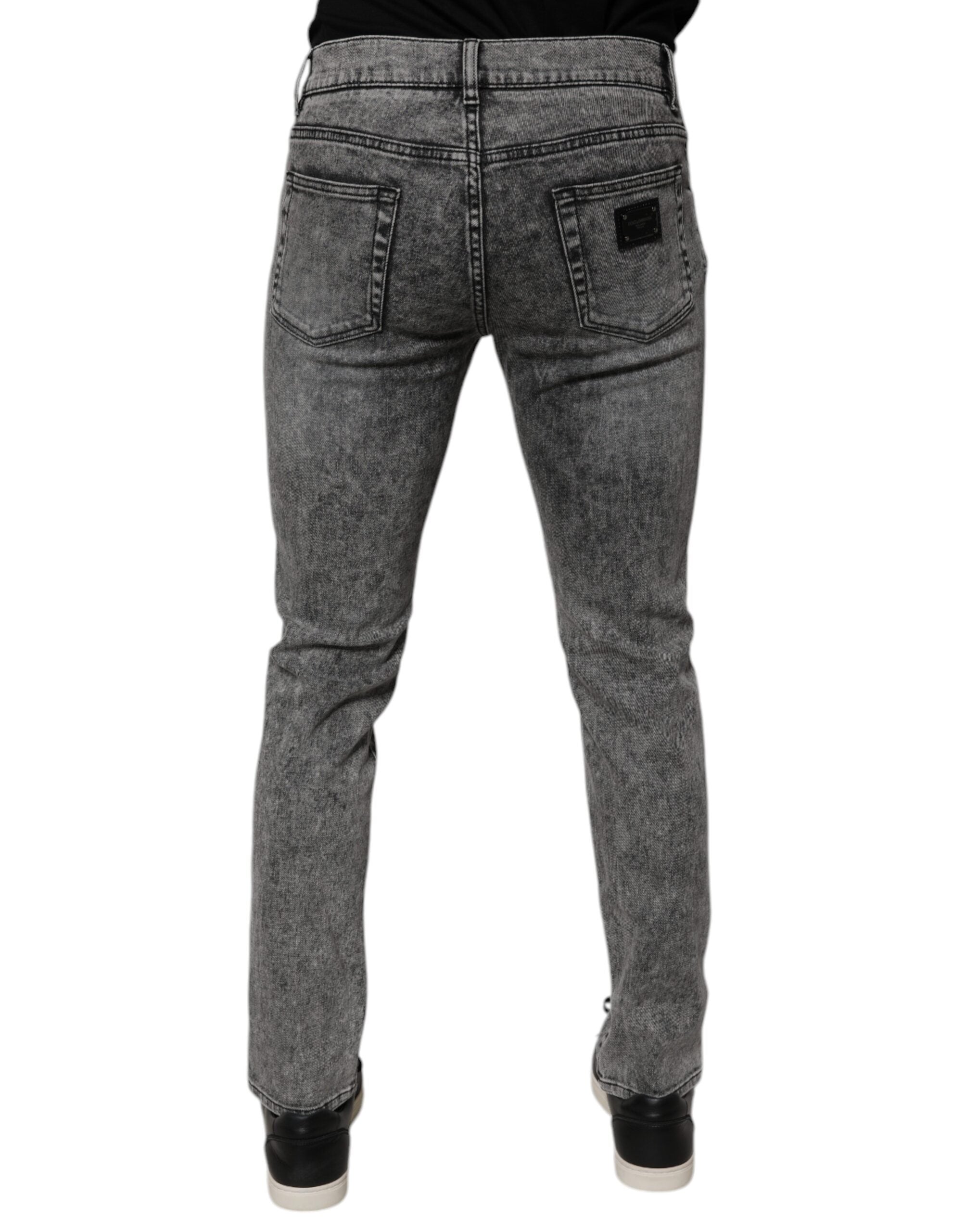 Jeans slim en denim gris foncé délavé de Dolce & Gabbana, coupe ajustée, détails classiques et couture soignée.