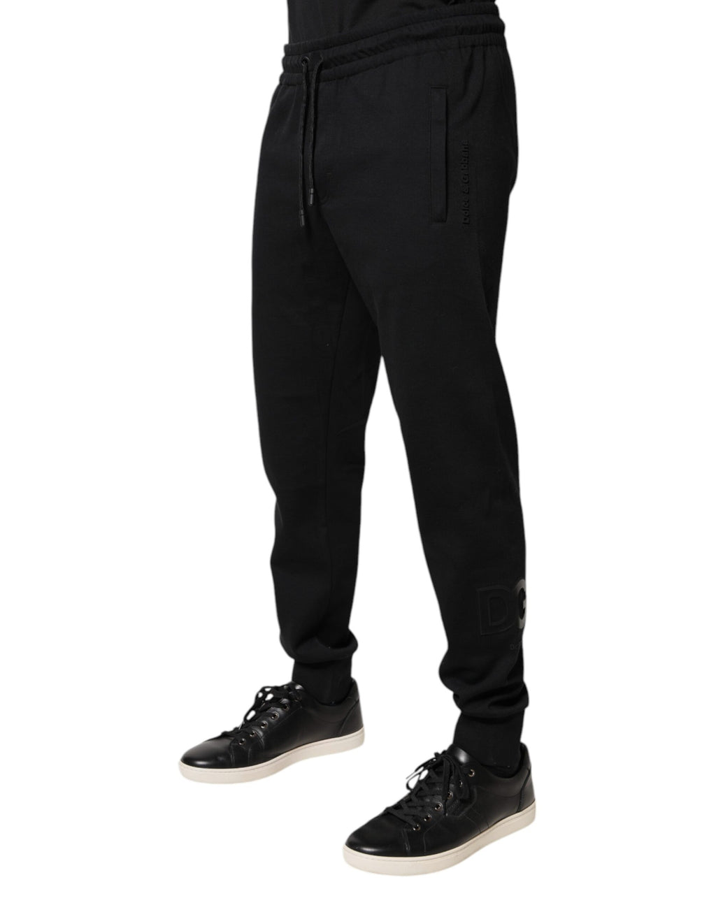 Pantalons de jogging noirs en coton de Dolce & Gabbana, style décontracté avec ceinture élastique et poches latérales.