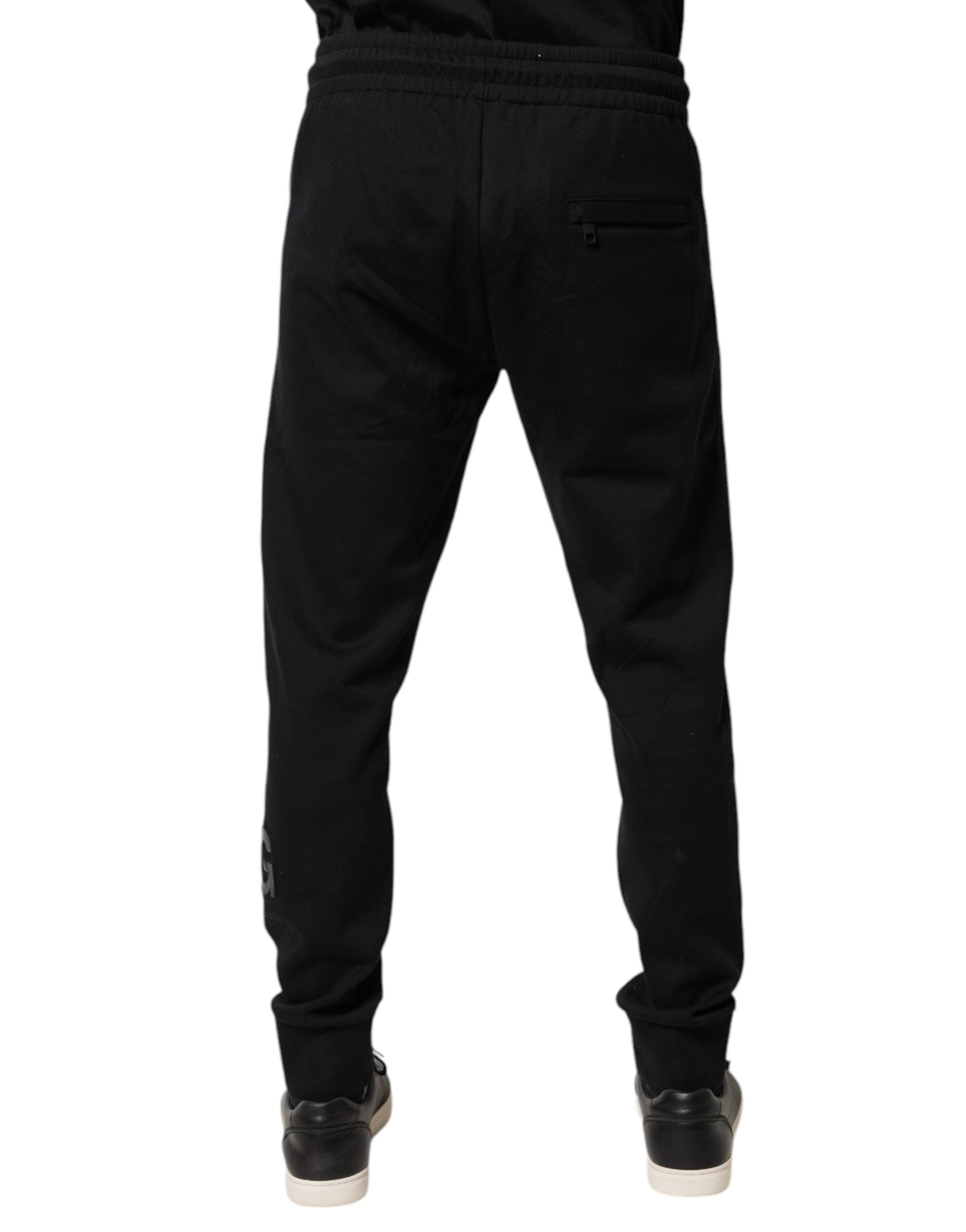 Pantalon de jogging Dolce & Gabbana en coton noir, style décontracté avec taille élastique et poches latérales.