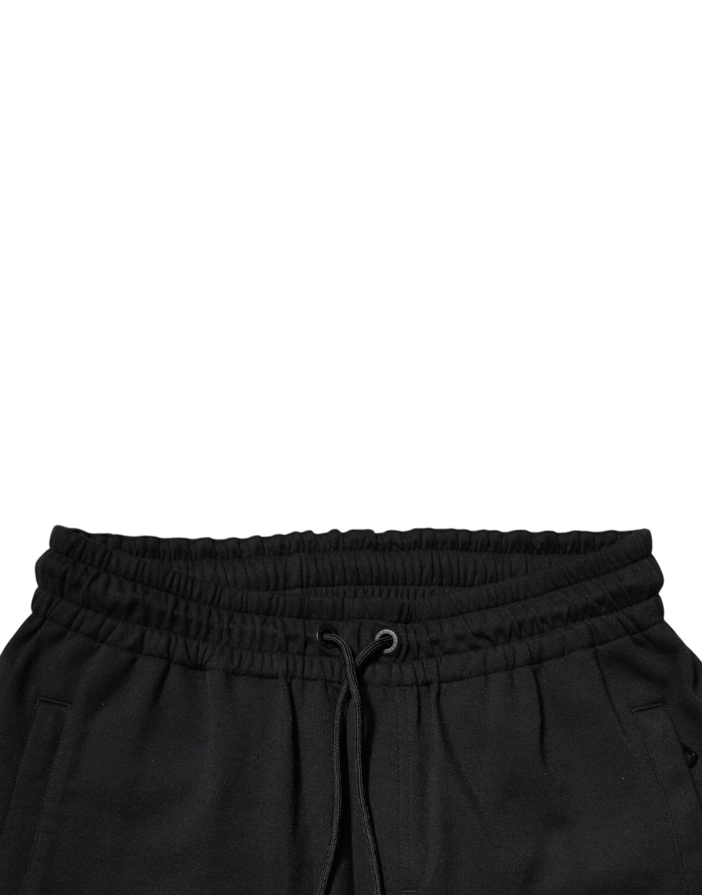 Pantalons de jogging Dolce & Gabbana en coton noir avec ceinture élastique et poches latérales, style décontracté et élégant.