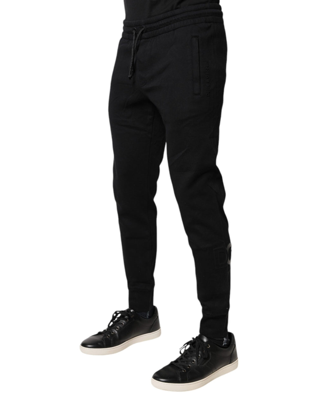 Pantalon de jogging noir en coton Dolce & Gabbana, style décontracté avec ceinture élastique et poches latérales.