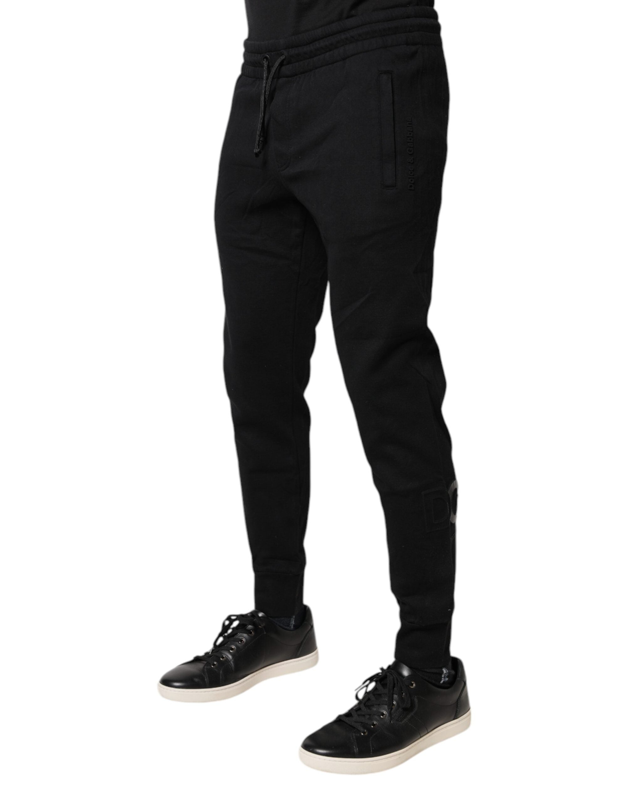 Pantalon de jogging noir en coton Dolce & Gabbana, style décontracté avec ceinture élastique et poches latérales.
