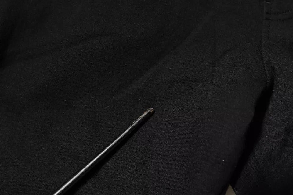Pantalon jogging noir en coton Dolce & Gabbana, style décontracté avec ceinture élastique et poches latérales.