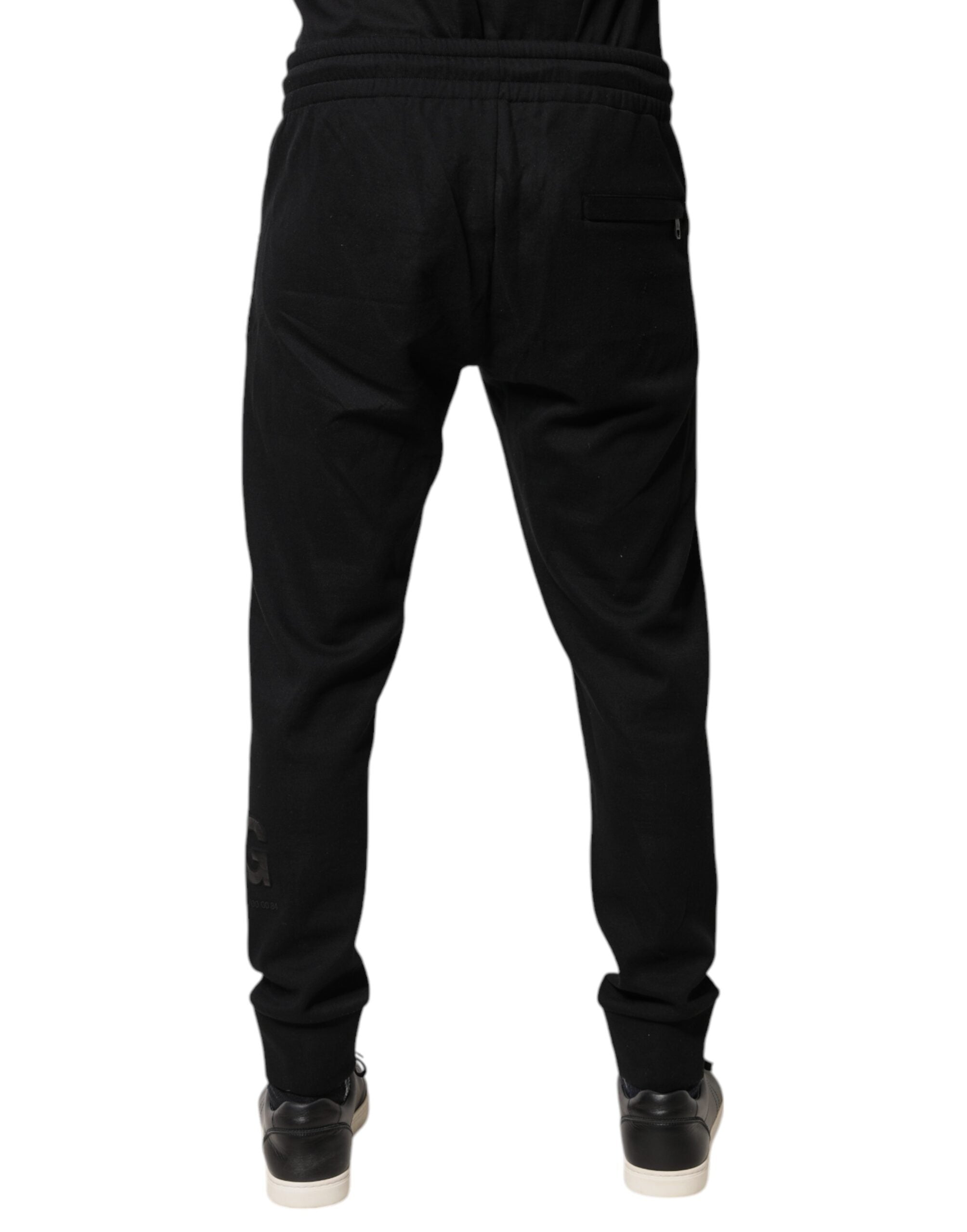 Pantalons de jogging noirs en coton Dolce & Gabbana, style décontracté avec ceinture élastique et poches latérales.