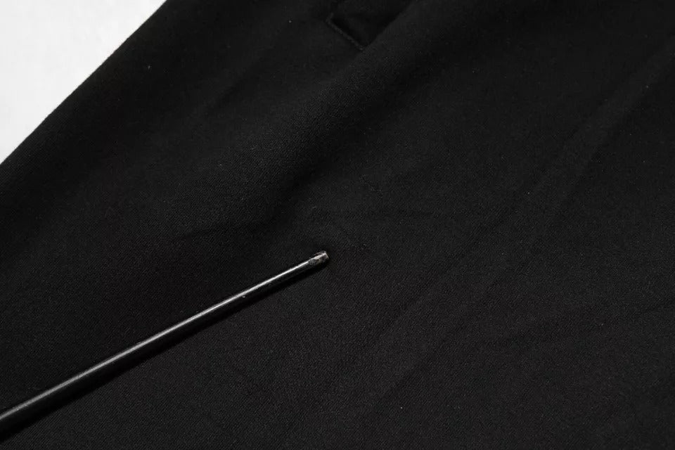 Pantalon jogger noir en coton de Dolce & Gabbana, style décontracté et confortable, avec ceinture élastique et poches latérales.