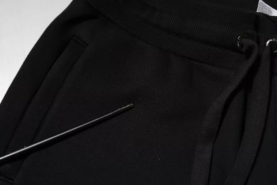 Pantalons de jogging noirs Dolce & Gabbana en modal, style décontracté avec ceinture élastique et poches latérales.