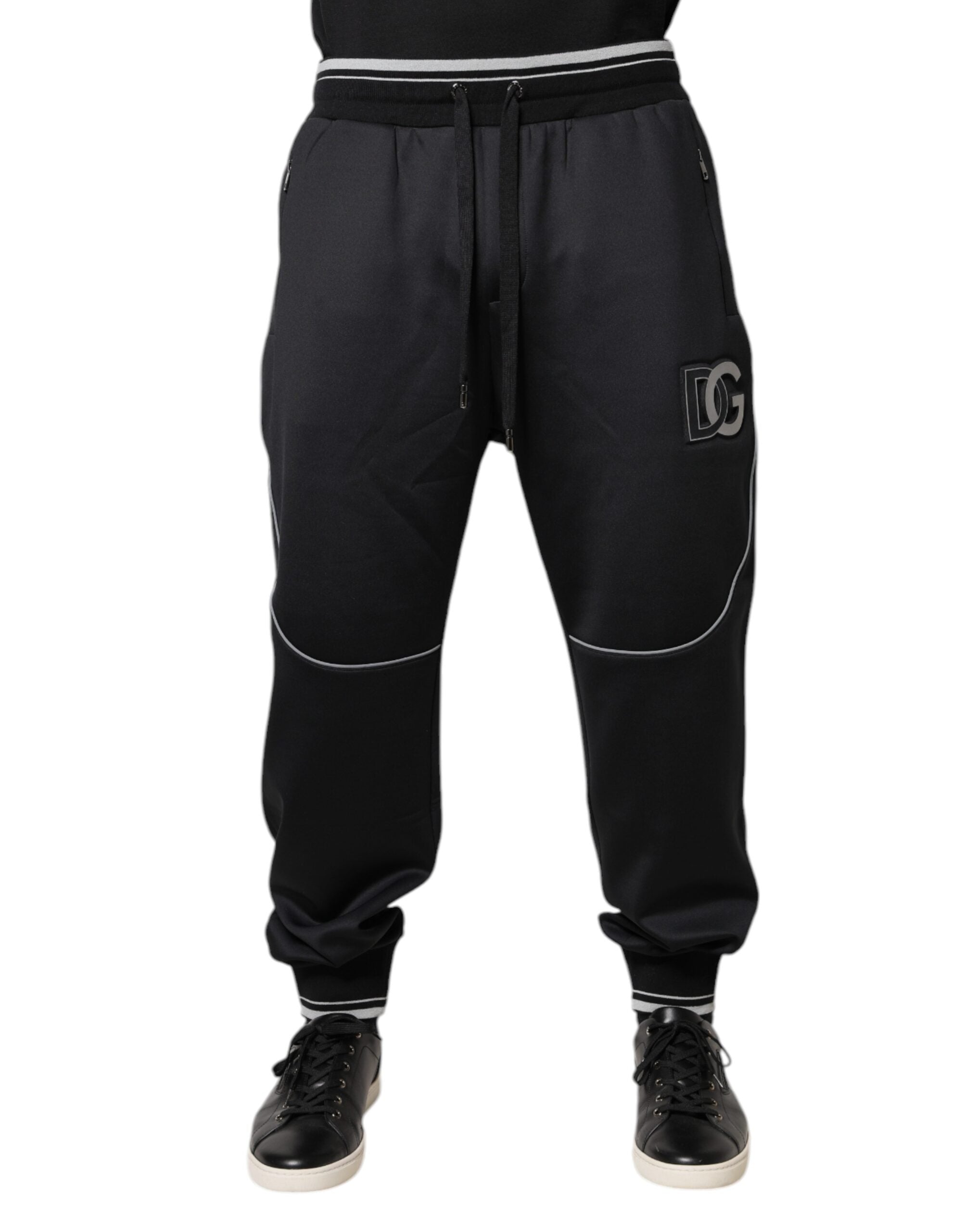 Pantalon jogging noir en polyester Dolce & Gabbana avec logo, coupe décontractée et détails de style sportif.