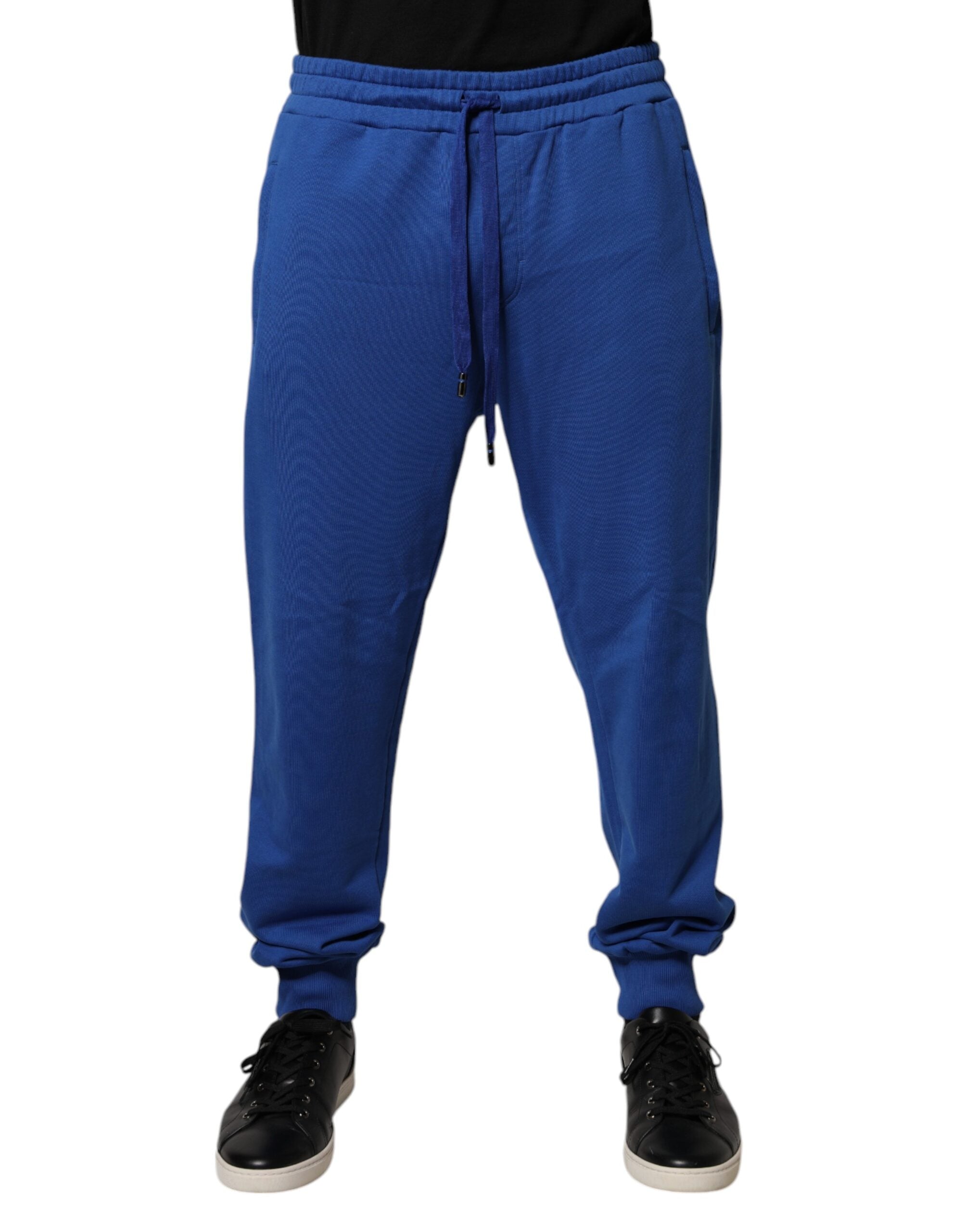 Pantalons joggers en coton bleu Dolce & Gabbana à taille moyenne, élégants et confortables pour un style décontracté.