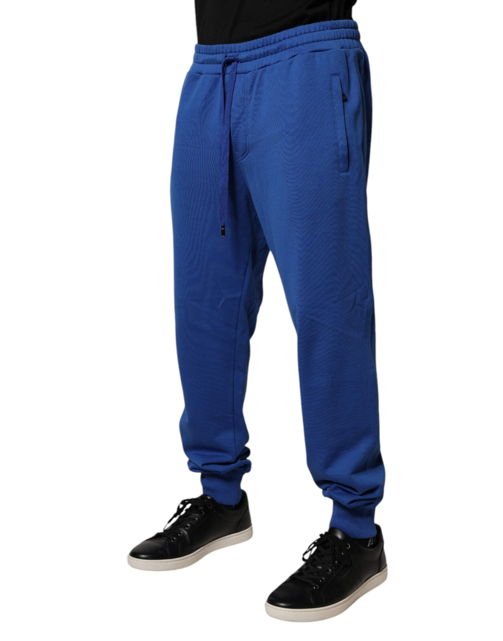 Pantalons joggers en coton bleu Dolce & Gabbana à taille moyenne, décontractés et confortables, visibles en gros plan.