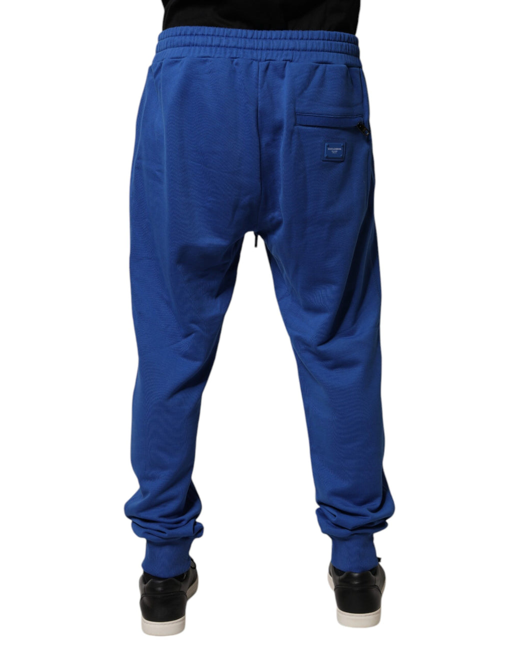 Pantalons joggeurs en coton bleu à taille moyenne de Dolce & Gabbana, vue de face, détails décontractés et couture élégante