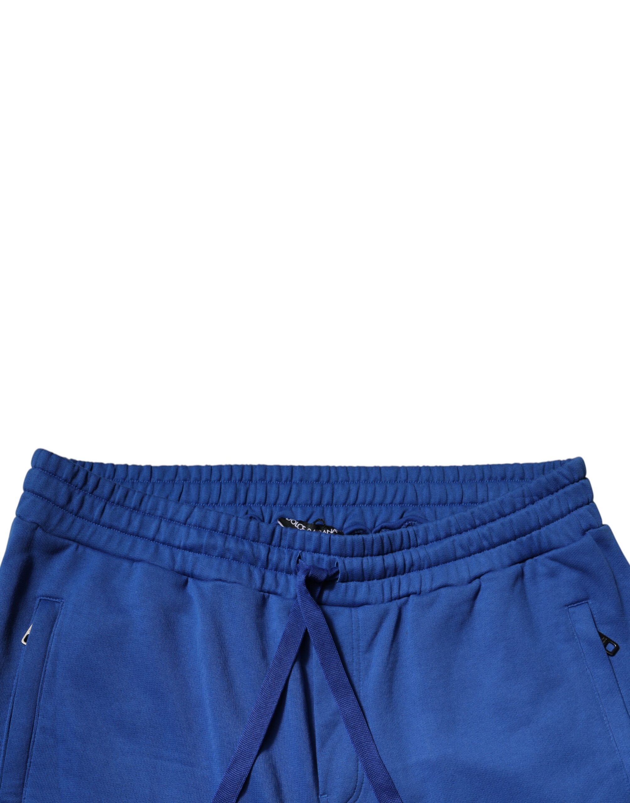 Pantalons joggers en coton bleu Dolce & Gabbana à taille moyenne, détails modernes et confortables.