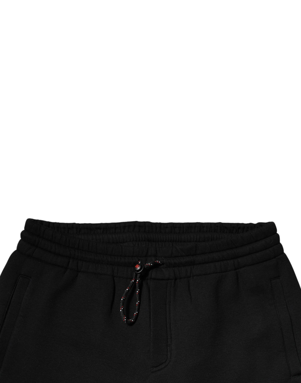 Pantalons joggers en coton noir Dolce & Gabbana avec patch logo, style décontracté et moderne.
