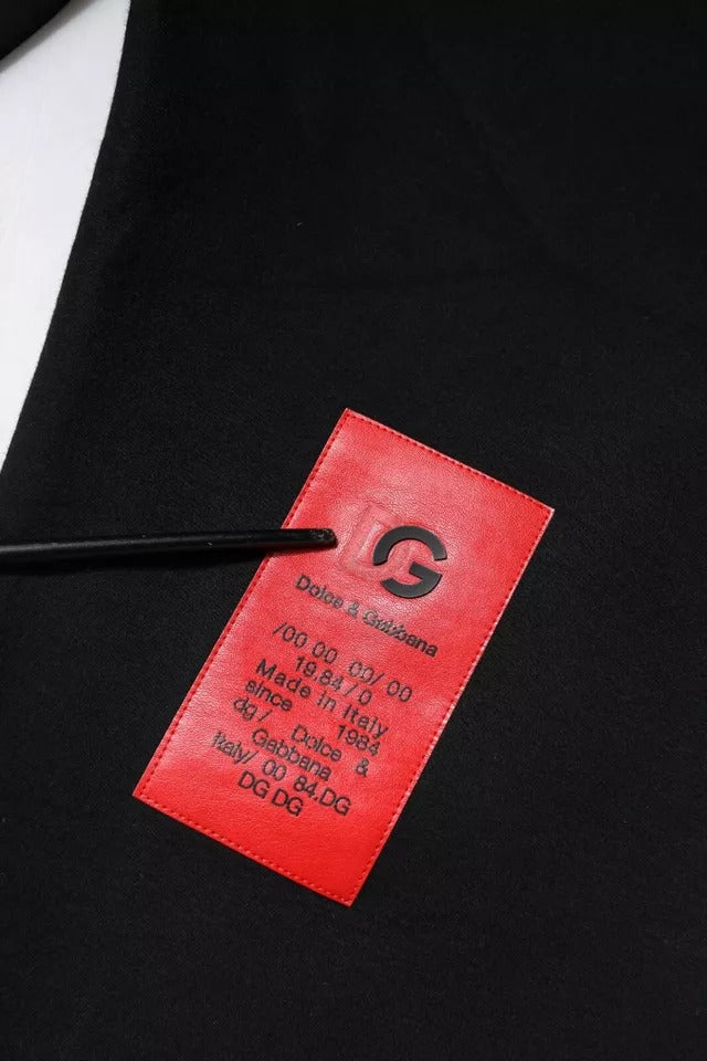 Pantalon jogger en coton noir Dolce & Gabbana avec patch logo, design décontracté et confortable, vue de face.