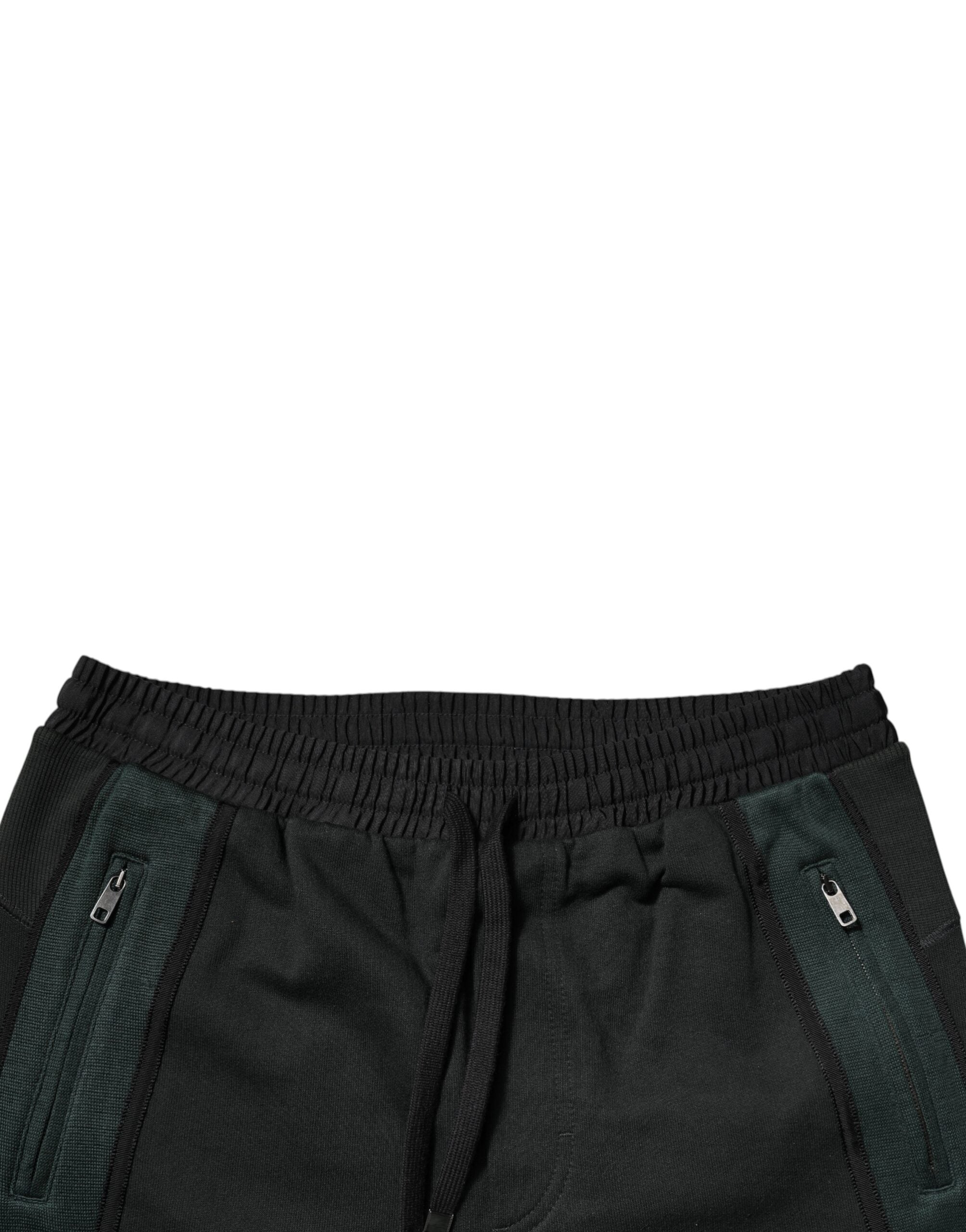 Pantalons jogging Dolce & Gabbana en coton mélangé noir, style décontracté avec ceinture élastique et poches latérales.
