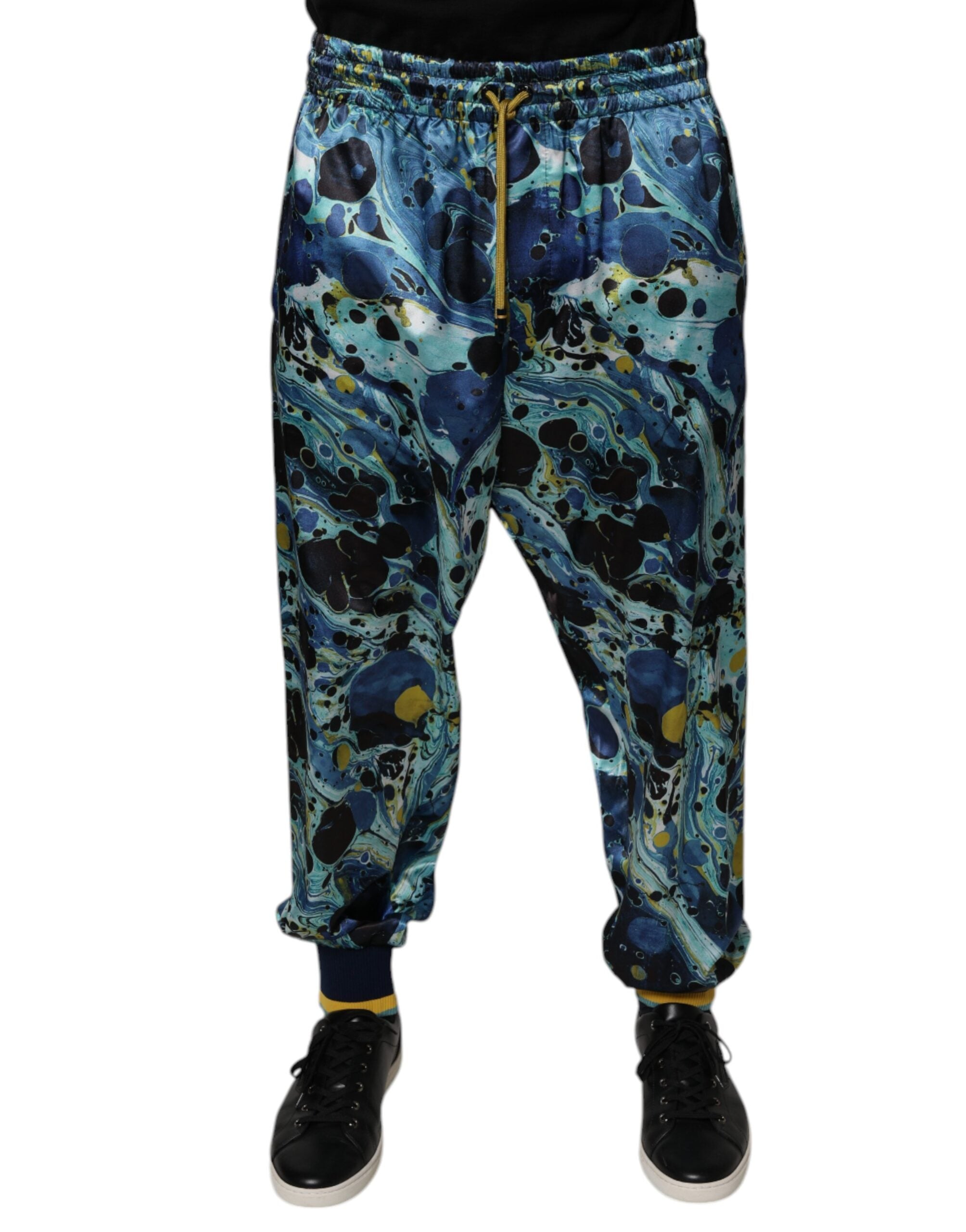 Pantalon jogger pour homme Dolce & Gabbana à motif marbre multicolore, style décontracté et tendance.